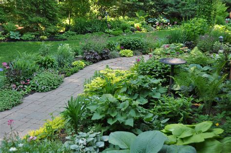 A season in one border in Daniela's Ohio garden - FineGardening