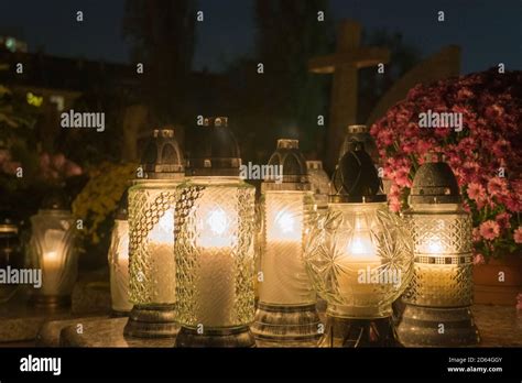 A set of grave candles on catholic cemetery Stock Photo - Alamy