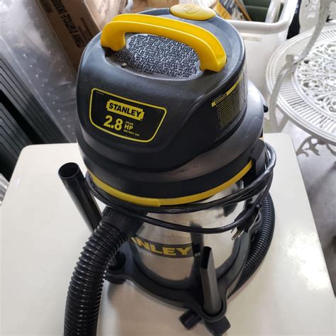 STANLEY 2.8HP SHOP VAC WITH ATTACHMENTS - Big Valley Auction