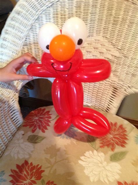 Elmo Made with a round, heart and 260. | Twisting balloons, Balloons, Elmo