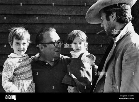 sergio leone whith his daughters, clint eastwood, 1966 Stock Photo - Alamy