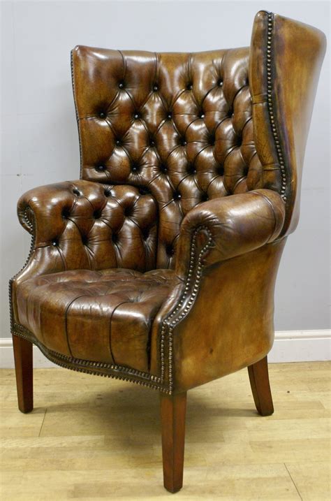 A Buttoned Leather Barrel Back Arm Chair - Antiques Atlas