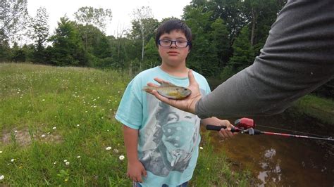 Took A Kid With Down Syndrome Fishing And Bought Him A Fishing Pole - YouTube