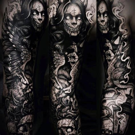 Demon and skulls with wings done in blackwork. A favorite darker piece. #demon #demons #macabre ...