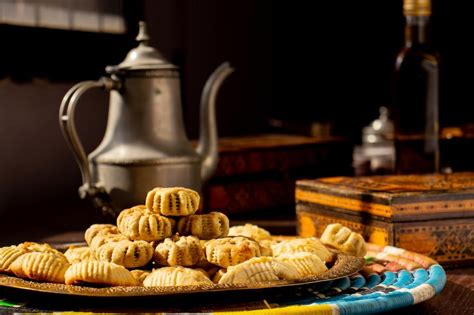 Premium Photo | Arabic sweets maamoul and coffee on traditional background