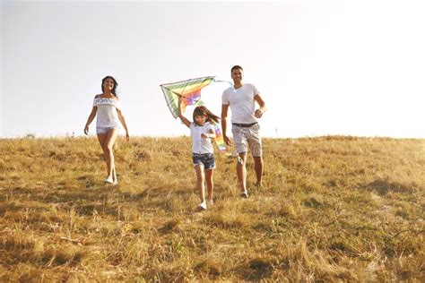 Happy Family Walking in Nature at Sunset in Summer. Stock Photo - Image of autumn, picnic: 146910484