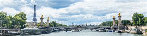 Pont Alexandre III bridge, Eiffel Tower and the Seine river in Paris ...