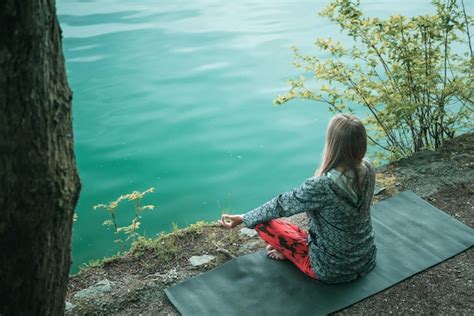 Premium Photo | Meditation by the water