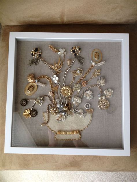 Shadow box display of vintage jewelry I love this Deb...thanks for pinning it # ...