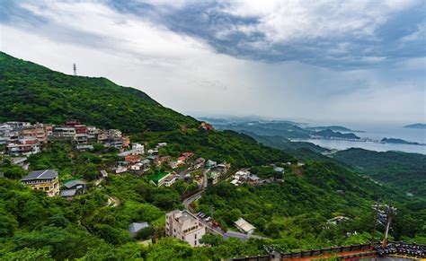 Premium Photo | Jiufen village with mountain in raining day, taiwan