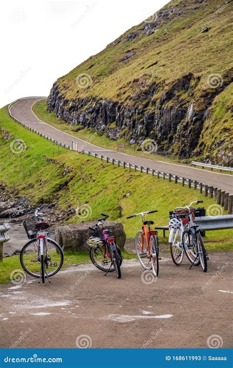 Bicycles Parked Near High Slope Road, Rear View Stock Image - Image of park, transportation ...