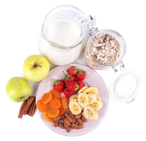 Premium Photo | Healthy cereal with milk and fruits isolated on white