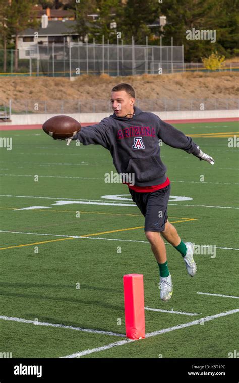 teen boy, teenage boy, boy, teenager, playing football, pick-up football game, San Marin High ...