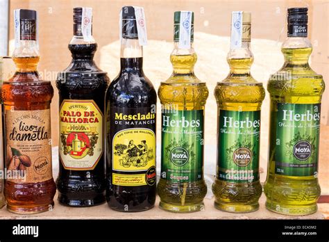 Herbal liqueur, almond liqueur, liqueurs, weekly market market of Porto Colom, Majorca, Balearic ...