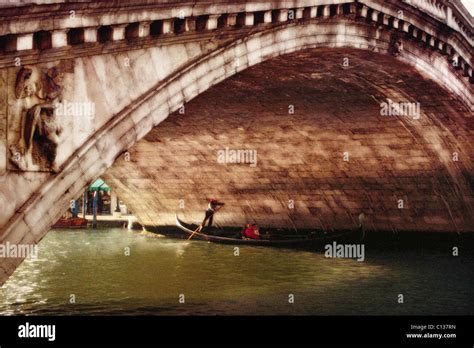 Rialto Bridge and Gondola, Venice Stock Photo - Alamy