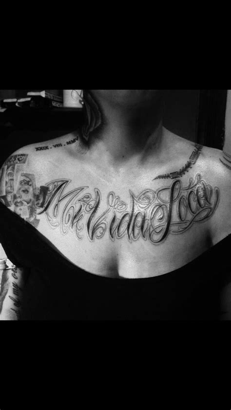 a woman with a tattoo on her chest