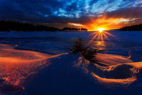 Download Sunbeam Sun Sunrise Snow Nature Winter HD Wallpaper