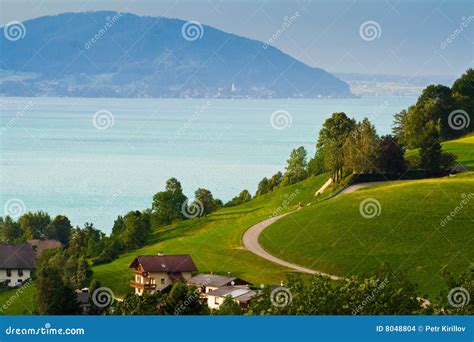 Alpine village and lake stock photo. Image of europe, landspace - 8048804