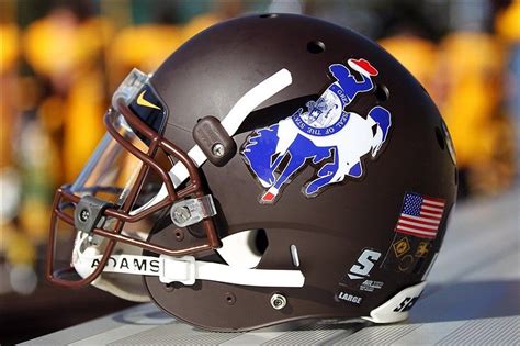 Wyoming Cowboys brown helmet with state flag logo. | College football ...