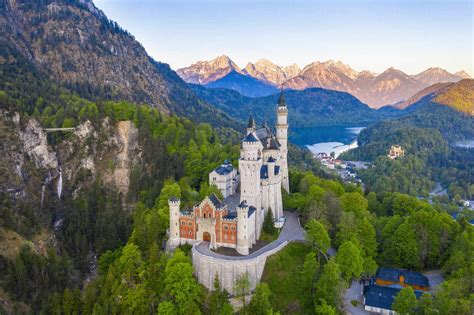 Germany, Bavaria, Hohenschwangau, Drone view of Neuschwanstein Castle in spring stock photo