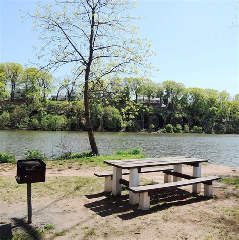 Picnic Table and Barbecue Grill at ... | Stock image | Colourbox