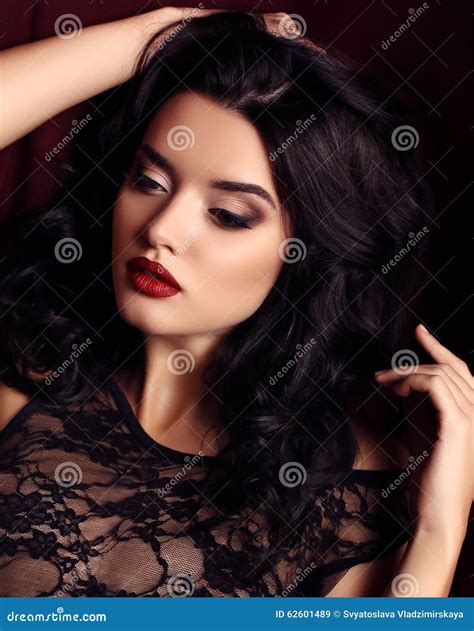 Woman with Dark Hair and Evening Makeup, Wears Luxurious Black Lace ...