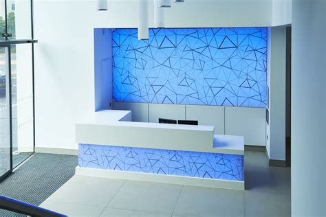 Zeta Specialist Lighting on Twitter | Feature wall, Reception desk, Led panel light