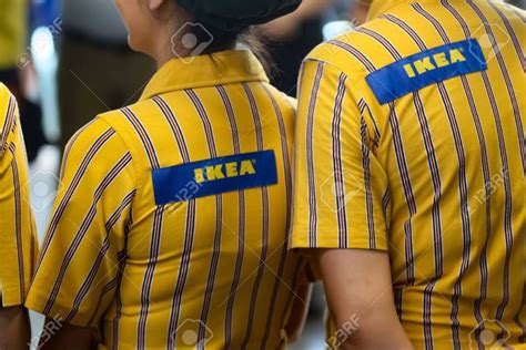 This uniform indicates that one works at the furniture store IKEA | Sports jersey, Tops, Jersey