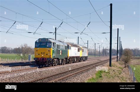 Devon and Cornwall Railways class 31 locomotive 31601 hauling 2 class 56s, 56091 + 56311 along ...