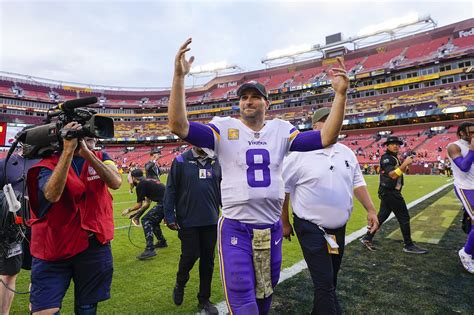 Kirk Cousins dances with celebration chains after Vikings win