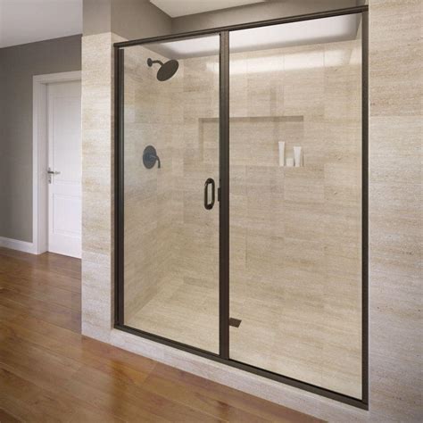 Basco Deluxe 47 in. x 68-5/8 in. Framed Pivot Shower Door in Oil Rubbed Bronze with Clear Glass ...