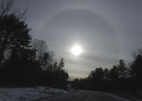 An atmospheric phenomenon known as a "sun dog" appears in the sky in Fort Ann, New York on ...