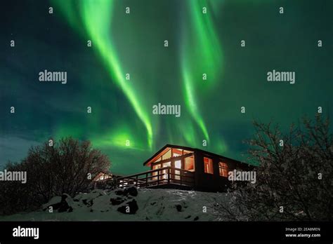 Iceland northern lights cabin hi-res stock photography and images - Alamy