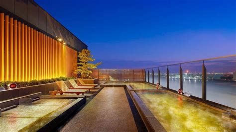 With a sprawling hot spring facility with three saunas, layovers will actually be fun at Tokyo's ...