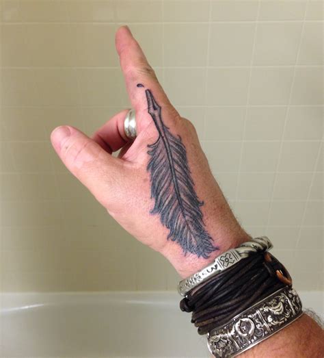 Cool feather pen hand tattoo - | TattooMagz › Tattoo Designs / Ink Works / Body Arts Gallery