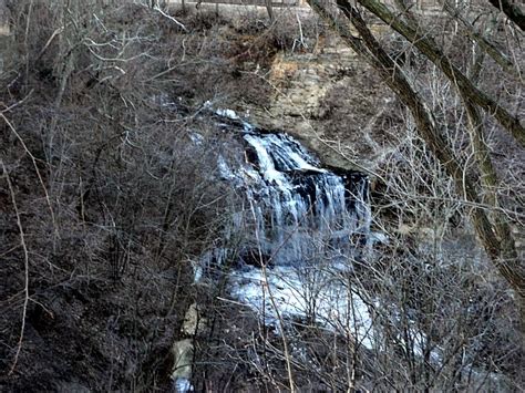 Cascade Falls semi-frozen waterfall down on Main Street in Osceola