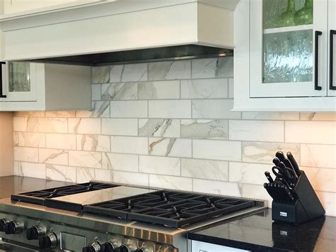 Calcutta Marble Backsplash - Love The White And Formal Moldings Traditional Kitchen Design ...