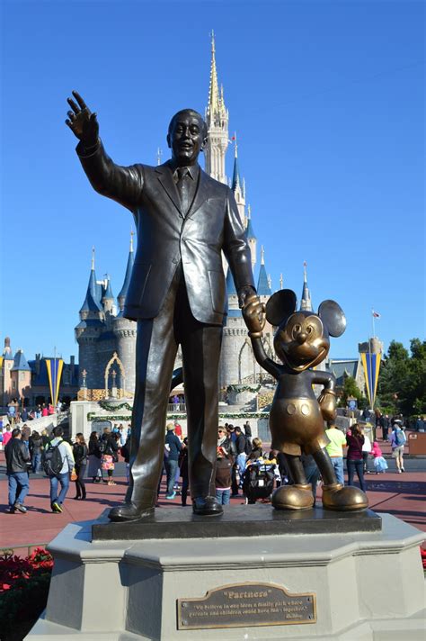 Walt Disney and Mickey Mouse statue in front of the Cinder… | Flickr