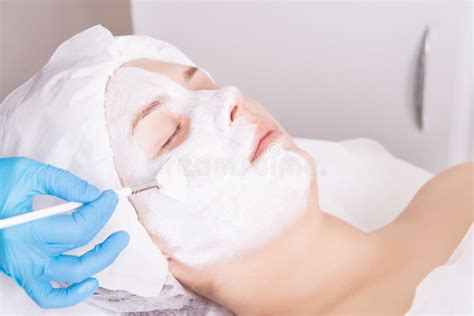 Face Peeling Mask, Spa Beauty Treatment, Skincare. Woman Getting Facial Care by Beautician at ...