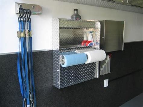 various car hauling trailer storage and organization solutions such as a ratchet strap hanger ...