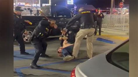 Video of Cops Beating Man With Baton in McDonald's Parking Lot Sparks Outrage, Family ...
