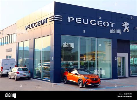 PEUGEOT dealer. Peugeot is a French automobile manufacturer Stock Photo ...