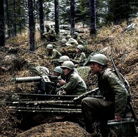 A colourised version of a popular image, photo taken 1st December 1944 in the Hurtgen Forest. I ...