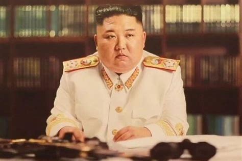 Kim Jong-un shows off new white military uniform for first time as he ...