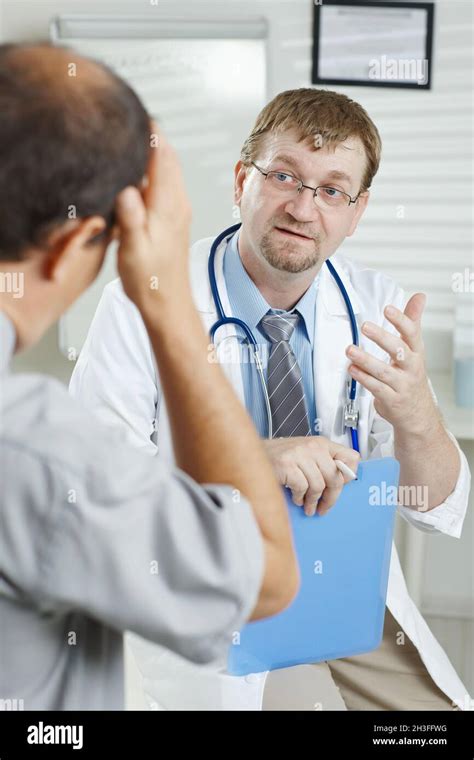 Patient telling symptoms to doctor Stock Photo - Alamy