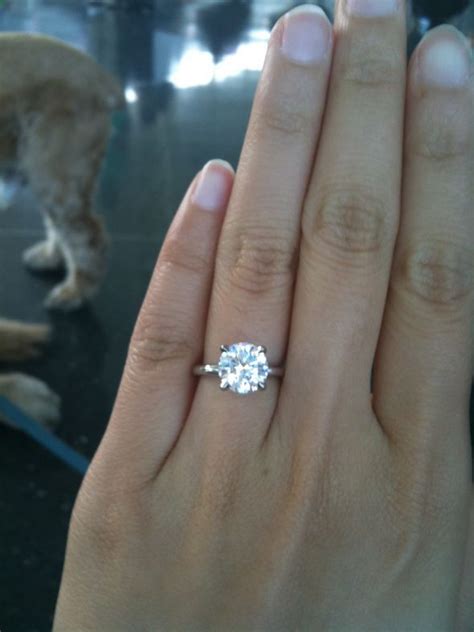 2-carat round solitaire diamond with simple platinum setting # ...