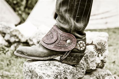 A cowboy's boot and spur | Buckaroo boots, Boots, Old boots