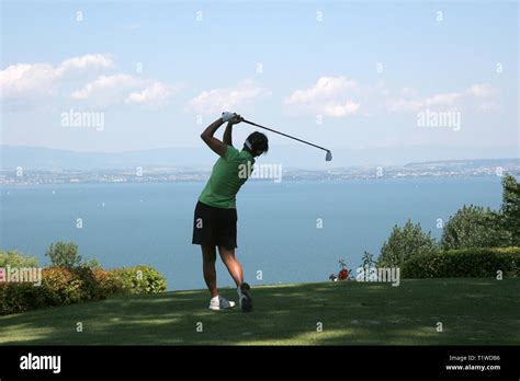 Lady golf swing Stock Photo - Alamy