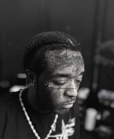 Lil Uzi Vert shows off new tattoos on forehead and tongue