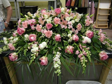 Roses Casket Spray | Funeral flowers, Casket flowers, Funeral floral arrangements